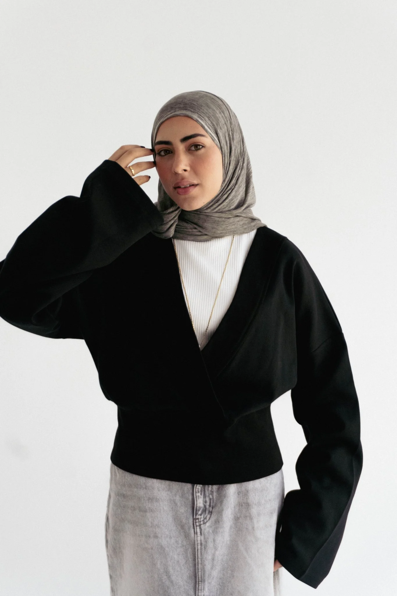 The wrap cozy top in Black - Image 3