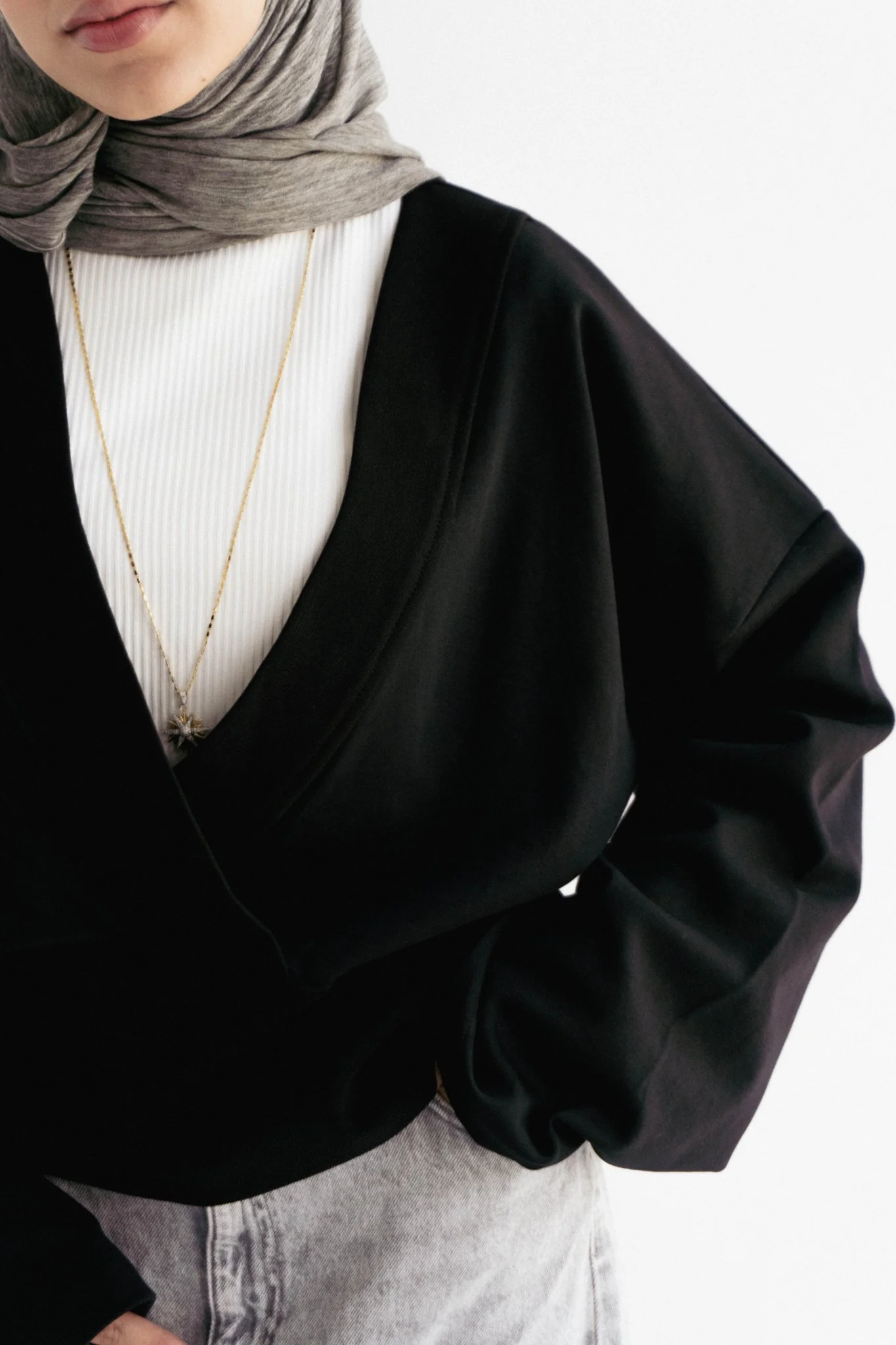 The wrap cozy top in Black - Image 4