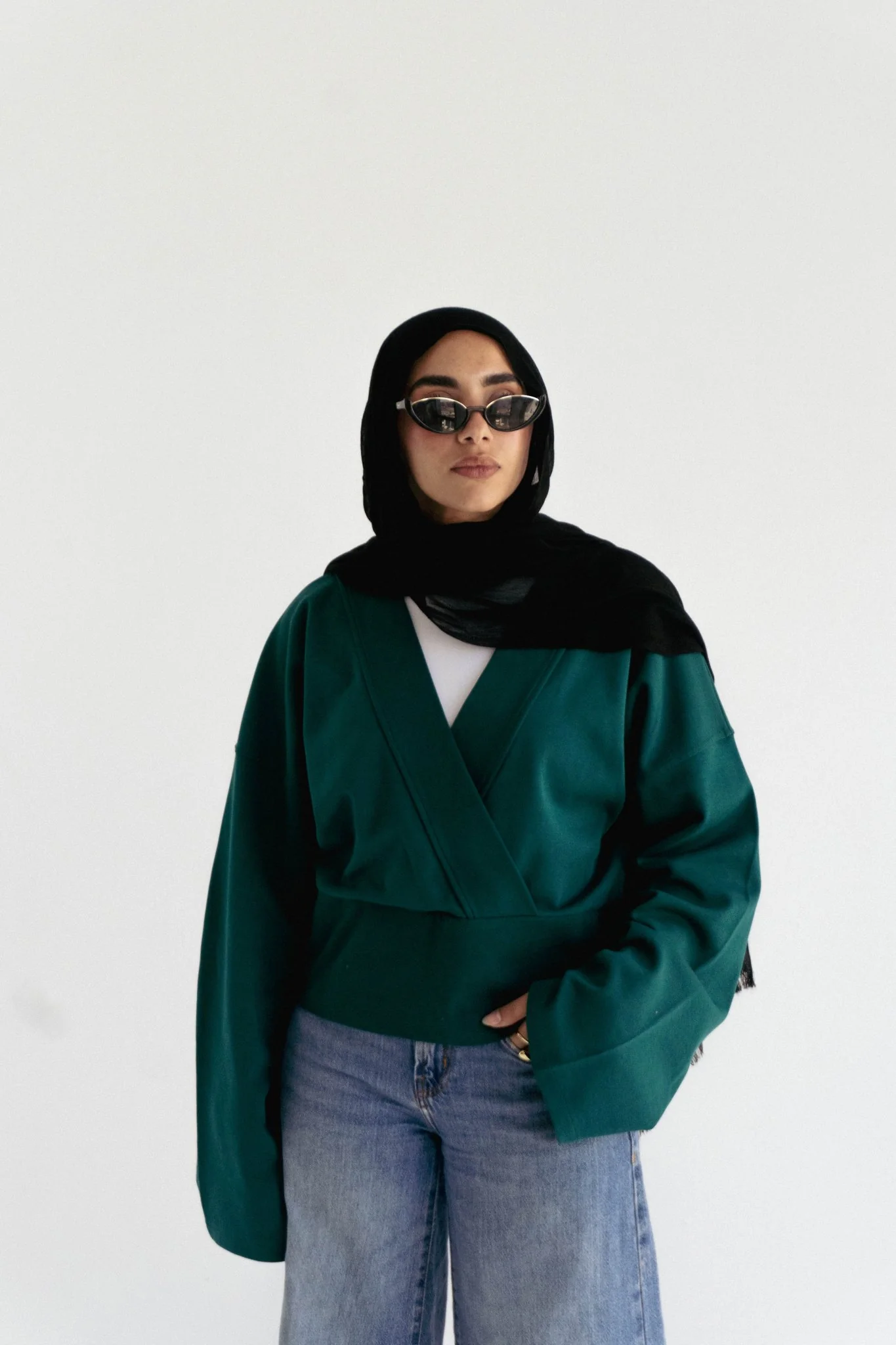 The wrap cozy top in emerald green
